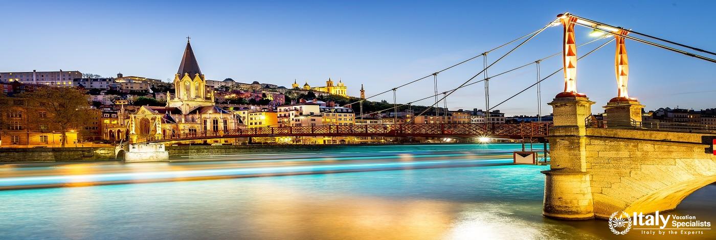 Night View from St Georges Footbridge in Lyon City with Fourviere Cathedral, France