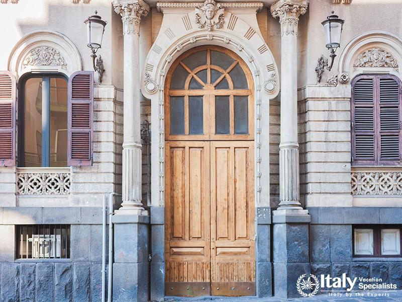 View on street of Catania, Sicily, Italy - facade of an historical building