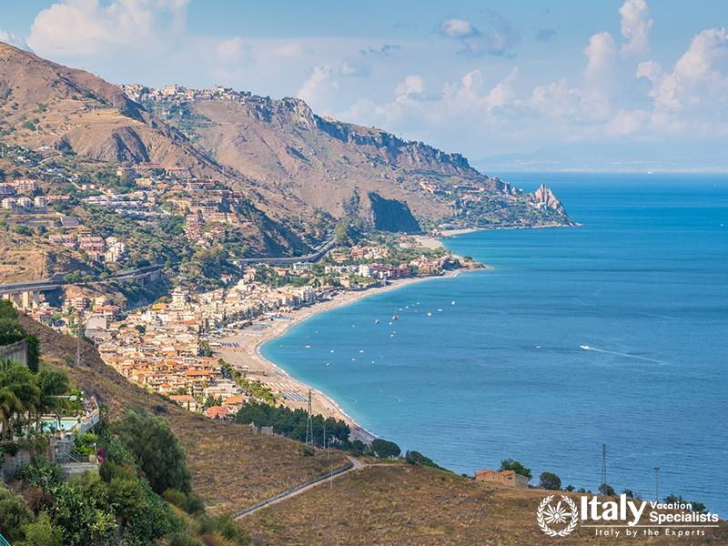Panoramic sight of the sicilian coastline as seen from Taormina. Province of Messina, Sicily, southe