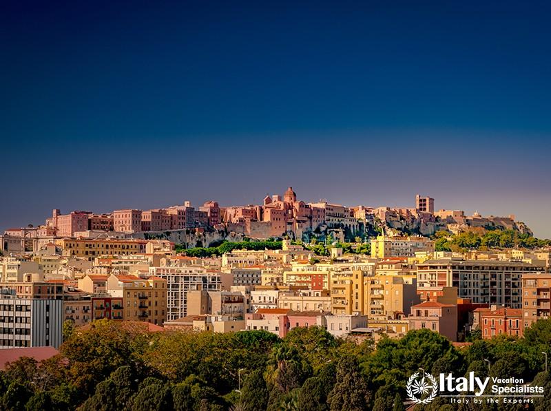Cagliari at sunset, capital of the region of Sardinia, Italy. Beautiful skyline image of the big cit