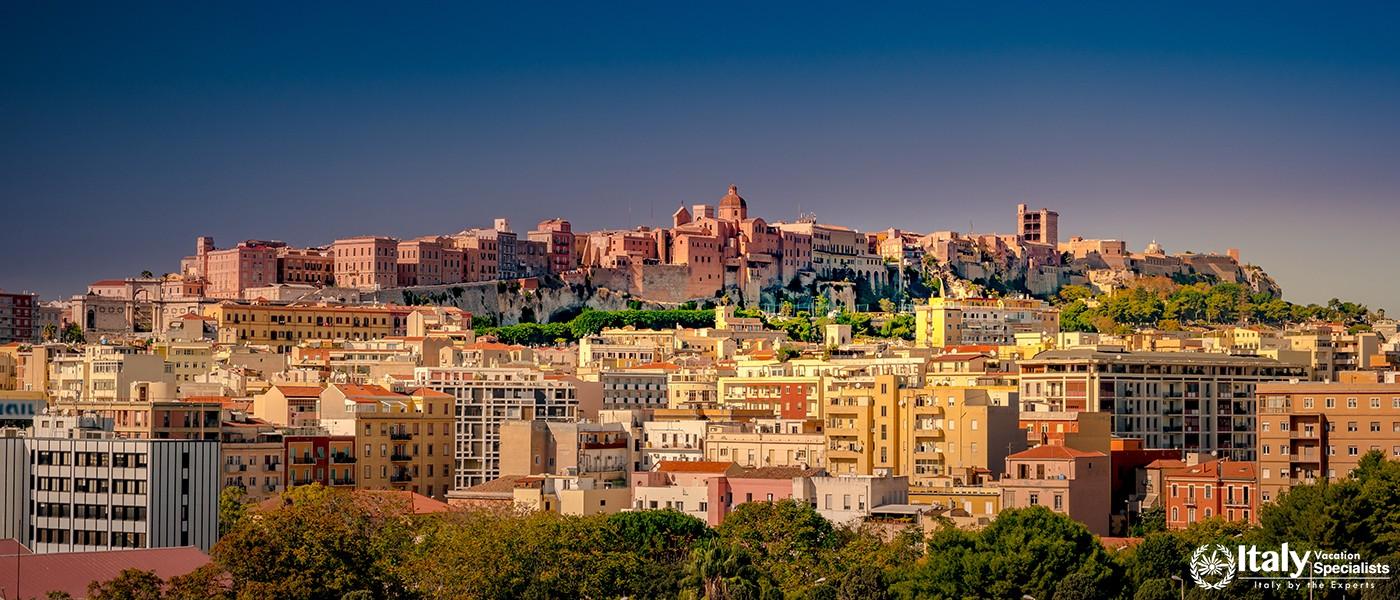 Cagliari at sunset, capital of the region of Sardinia, Italy. Beautiful skyline image of the big cit