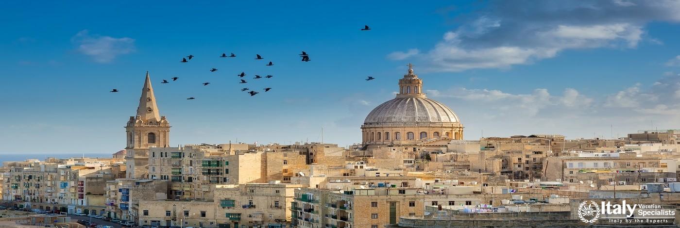 Valetta City Buildings with Birds Flying Over Them, Malta