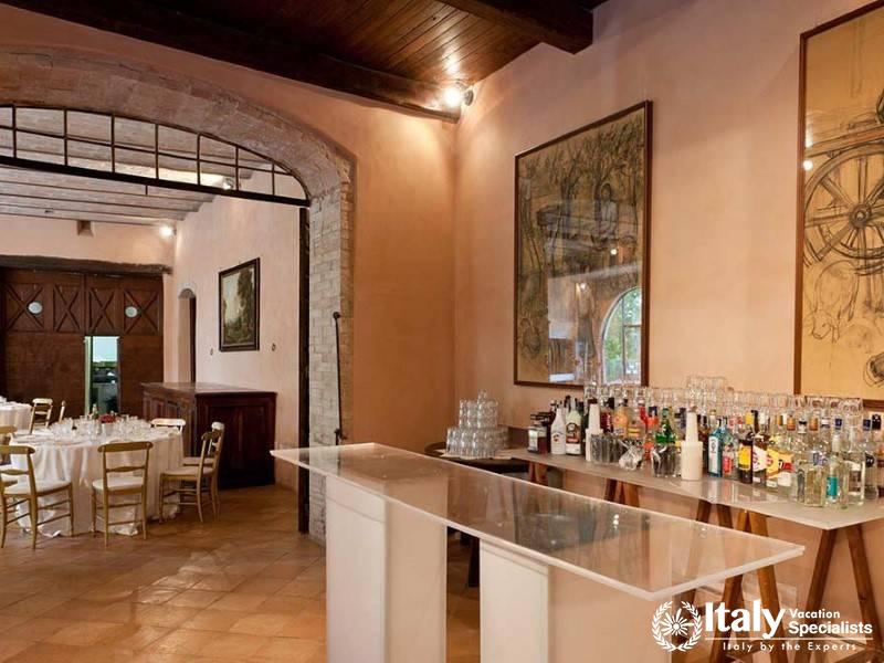 Traditional bar setting with arches and rustic elements, perfect for intimate gatherings.