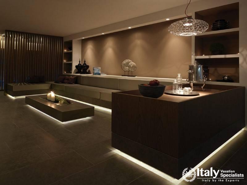 Sleek and contemporary spa lounge featuring minimalist design and ambient lighting for relaxation.