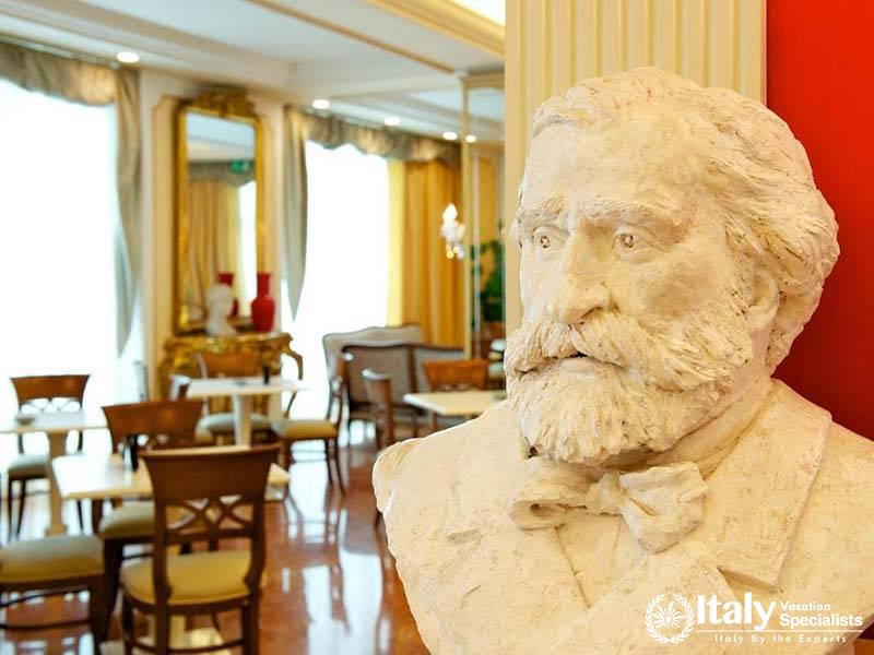 Statue of Giuseppe Verdi in the Dining Area at Mercure Parma Centro Stendhal in Parma, Italy