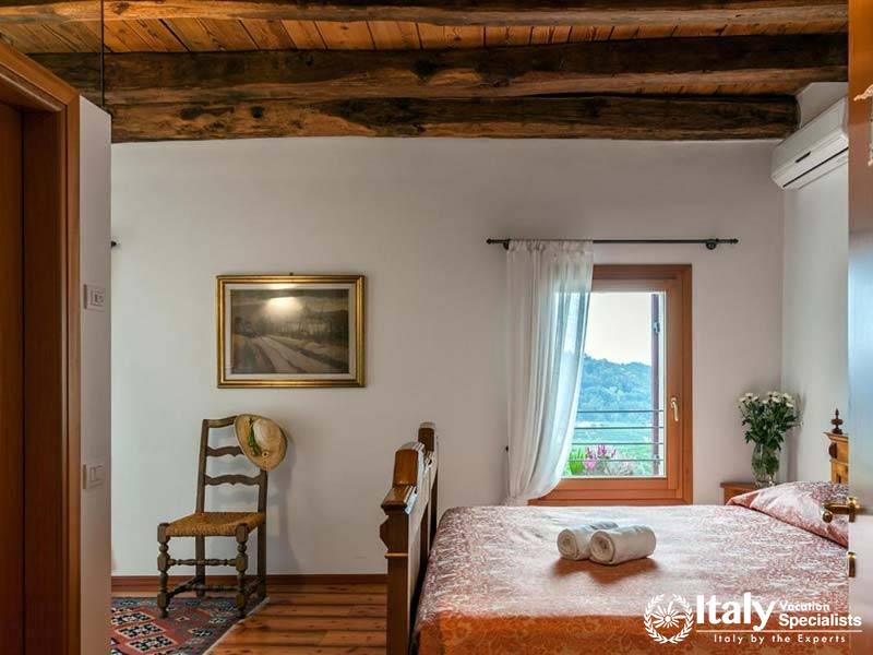 Charming Rustic Room with Scenic Views at Agriturismo Due Carpini in Valdobbiadene, Italy