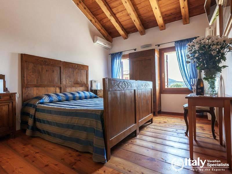 Cozy Bedroom with Mountain Views at Agriturismo Due Carpini in Valdobbiadene, Italy