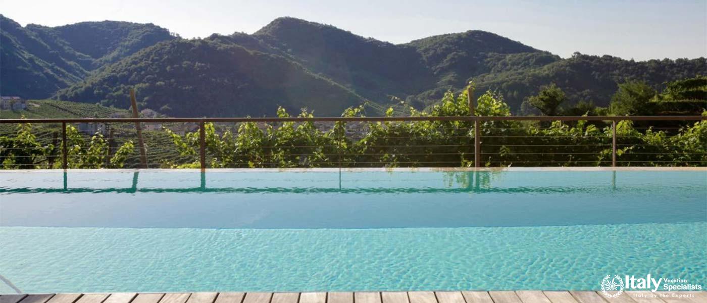 Infinity Pool with Stunning Views at Agriturismo Due Carpini in Valdobbiadene, Italy