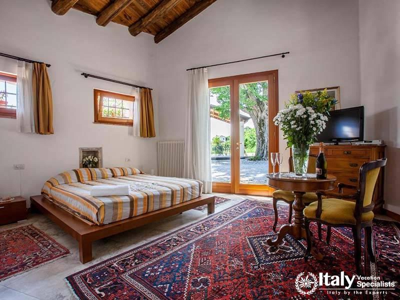 Rustic Bedroom Charm at Agriturismo Due Carpini in Valdobbiadene, Italy