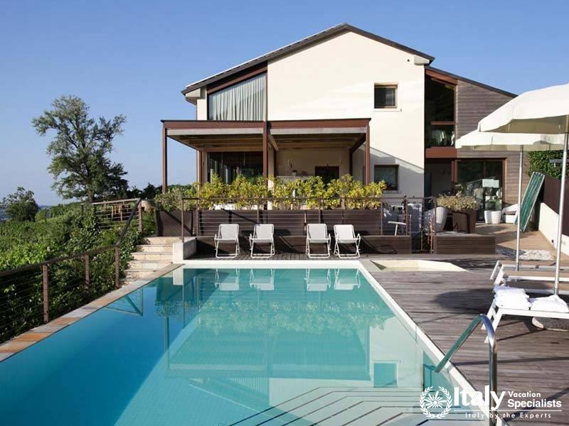 Inviting Pool Area with Spectacular Vineyard Views at Agriturismo Due Carpini in Valdobbiadene, Ital