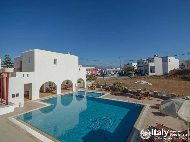 Spacious pool area at Perla Hotel in Naxos, Greece