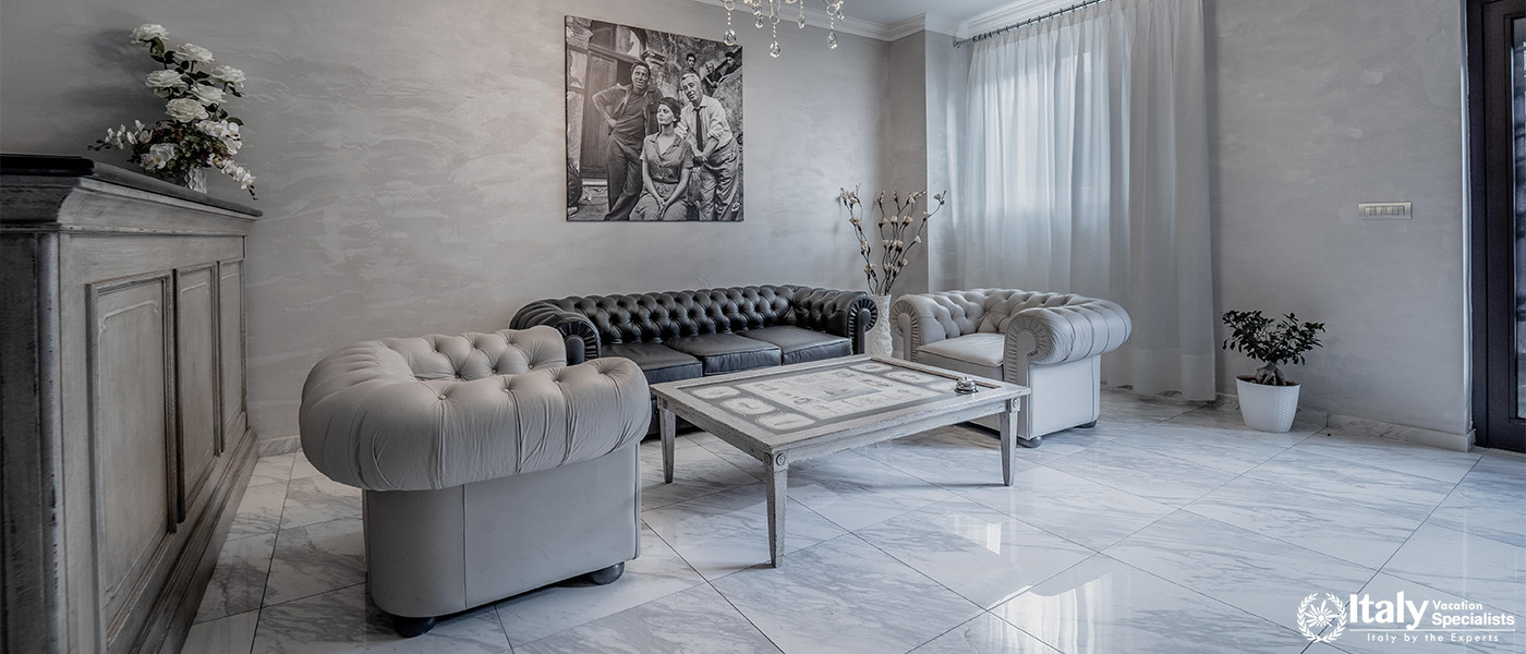 Elegant lounge area of Hotel Colomba D'Oro in Tropea, Italy
