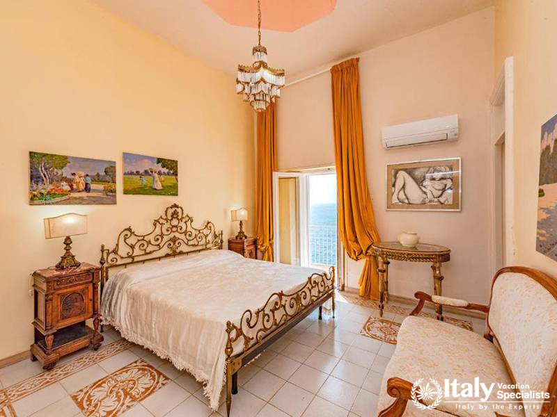Bright Bedroom with Ocean View in Villa Bellissima Vista Mare in Campania, Italy
