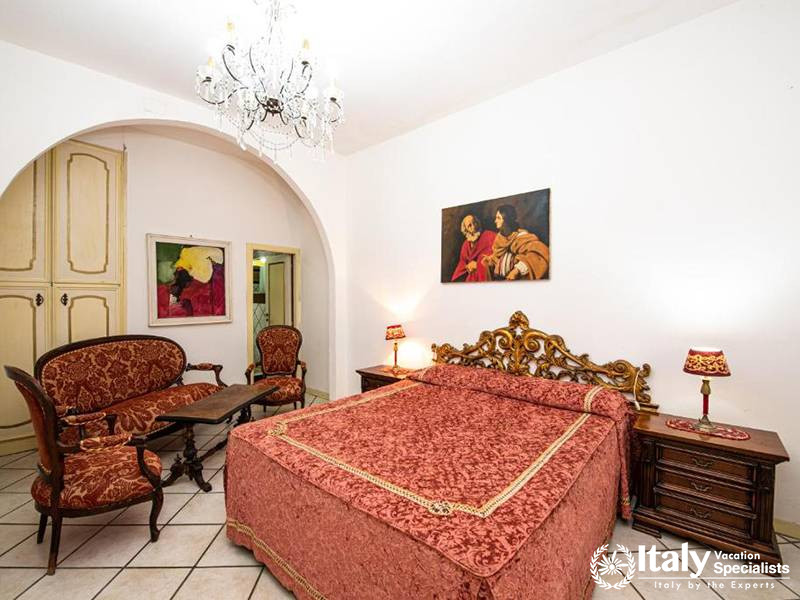 Luxurious Bedroom with Classic Furniture in Villa Bellissima Vista Mare in Campania, Italy