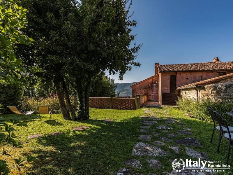 Serene garden with scenic views and comfortable seating.