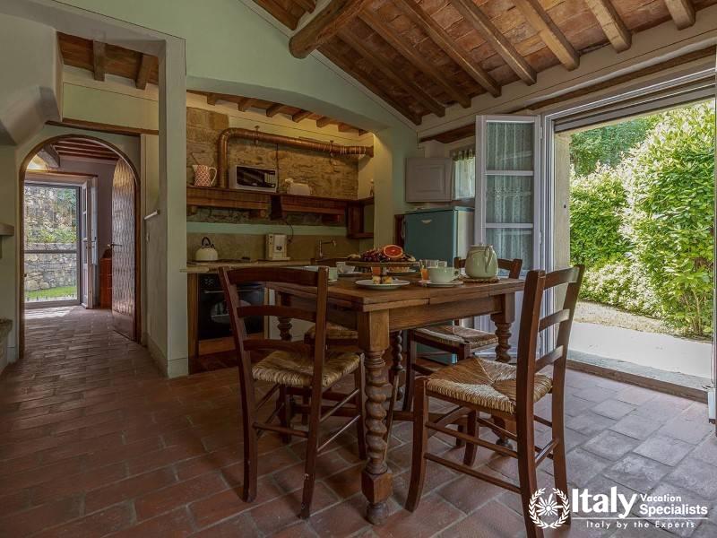 Open Dining Area: Cozy dining space with garden access.