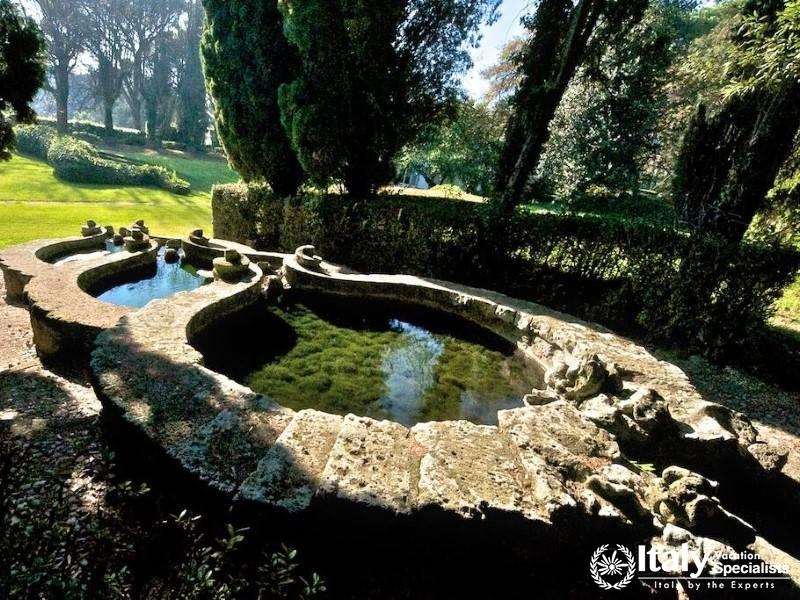 Tranquil garden with a unique stone water feature.
