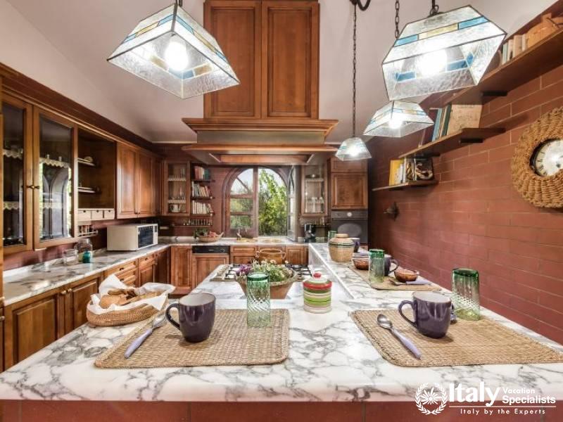 Charming kitchen with a rustic island and ample space for casual dining.