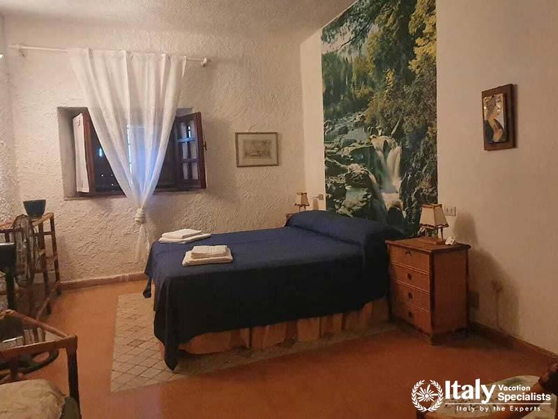 Peaceful Bedroom with Scenic Wall Art