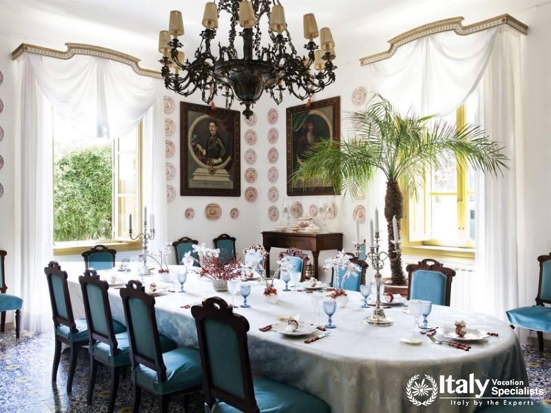 The grand dining room at Villa Sole di Marsala creates the perfect space for meals.