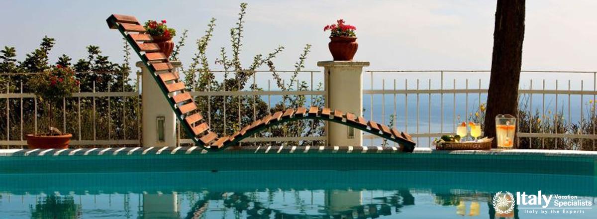 Furniture near swimming pool