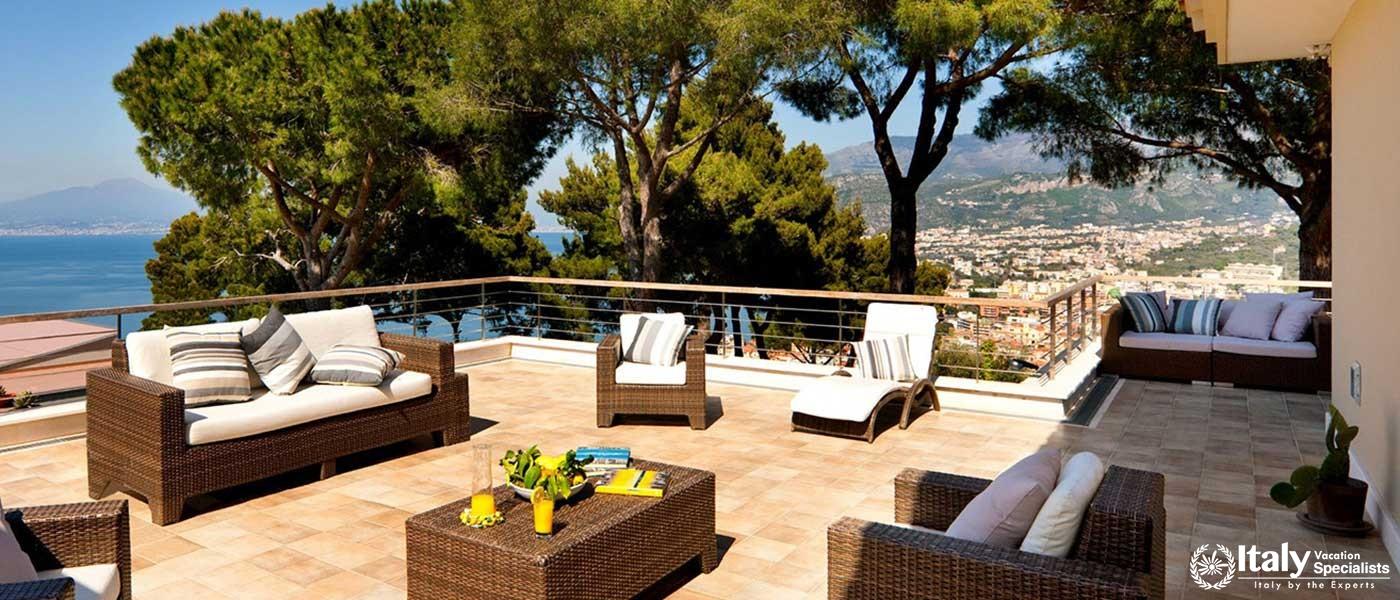 Outdoor sofas and sitting area in Villa Moyria