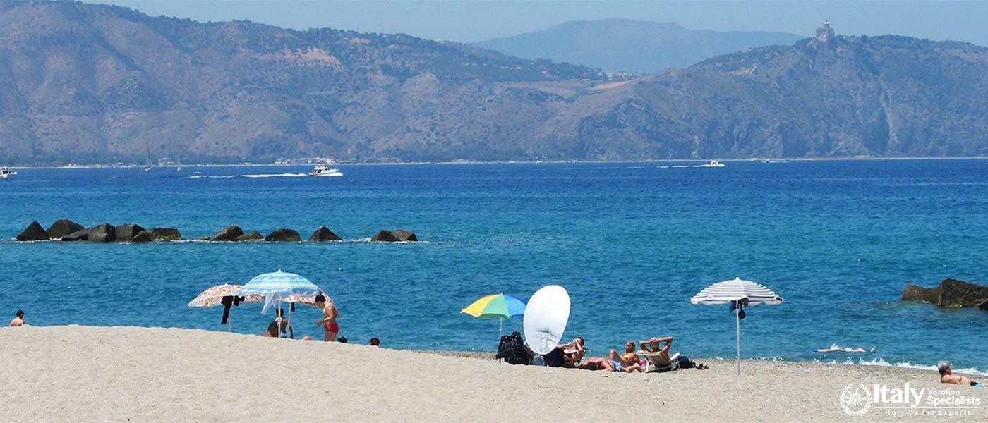 Golden sands and clear waters, minutes from the villa.