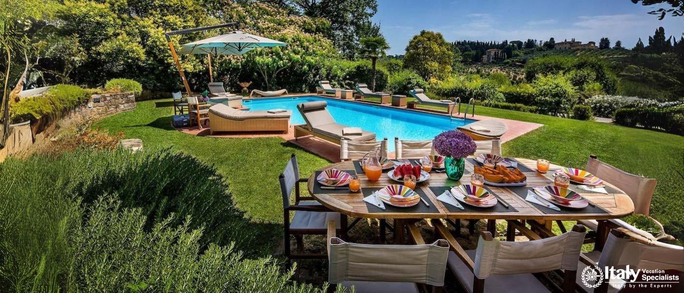 Outdoor Furniture by Swimming Pool in Villa Fiori d'Arte