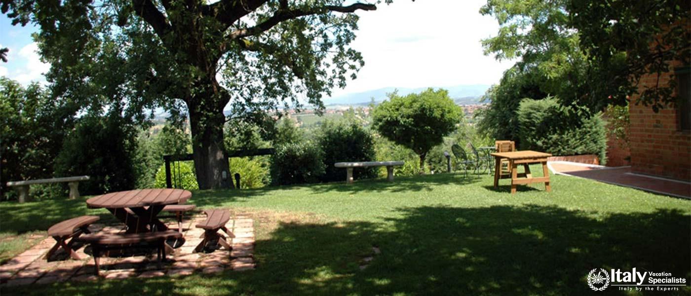 A shaded picnic area with a panoramic view of the countryside.