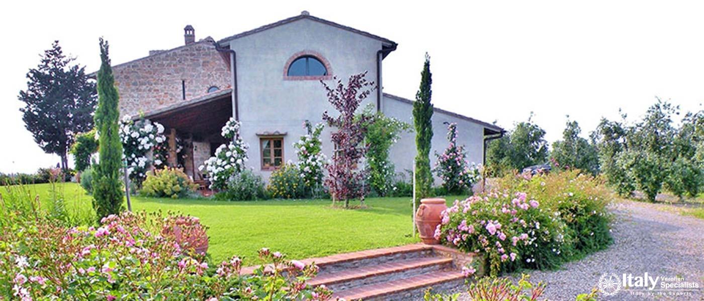 Charming villa surrounded by lush gardens near Florence, Italy.