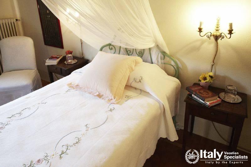 Book on the side-table in the bedroom of Villa Prodigioso