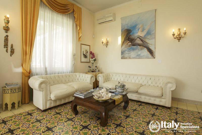 Sofas and sitting area in Villa Recupero