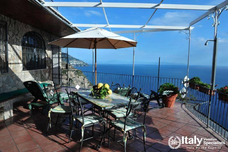 Outdoor sitting with wonderful sea-view in Villa Clara