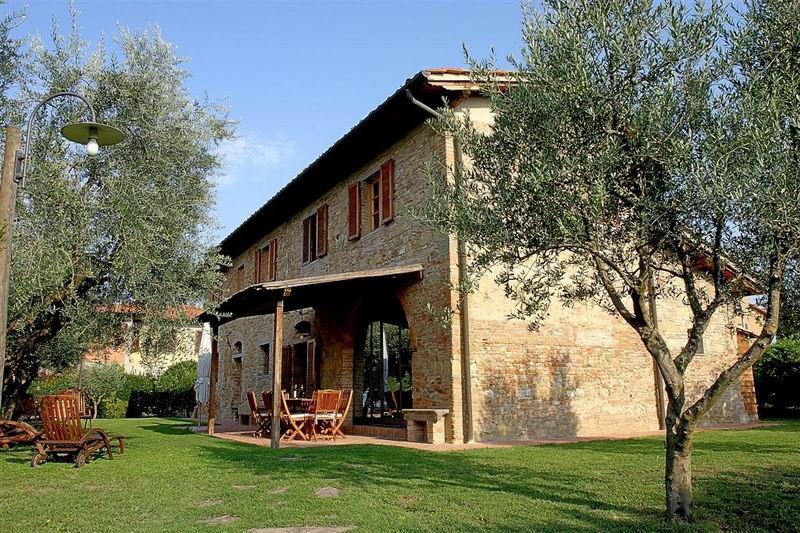 the garden and porch at the villa