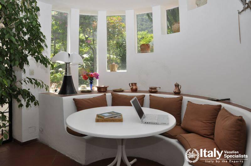 Circular sofas and sitting area indoor in Villa Giulia