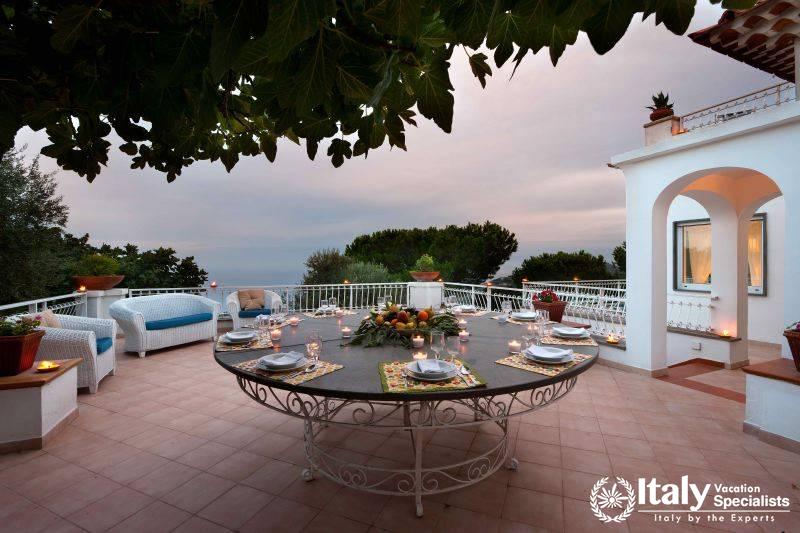 Outdoor sofas and sitting area in Villa Mafalda