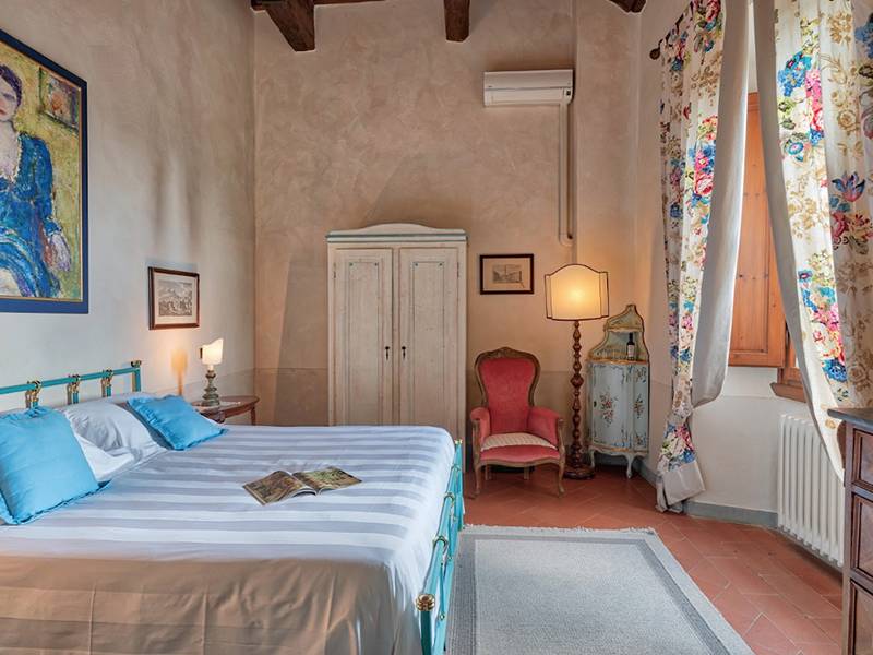 amazing interior of bedrooms in Villa La Canonica di Cortine