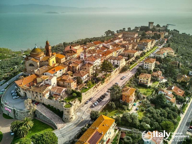 Aerial view of Castiglione del Lago, a picturesque town perched on the shores of Lake Trasimeno.