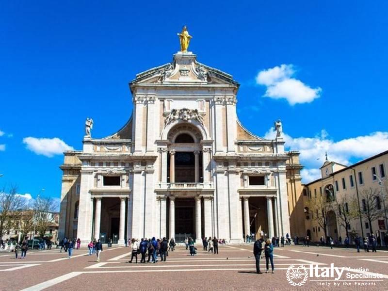 The grand Basilica of Saint Mary of the Angels, a key pilgrimage site in Assisi.