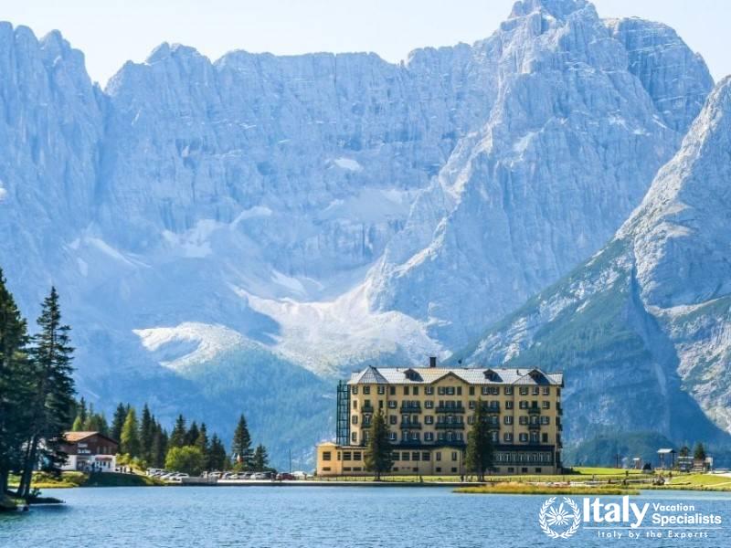 The tranquil Lake Misurina, surrounded by towering peaks and alpine charm.