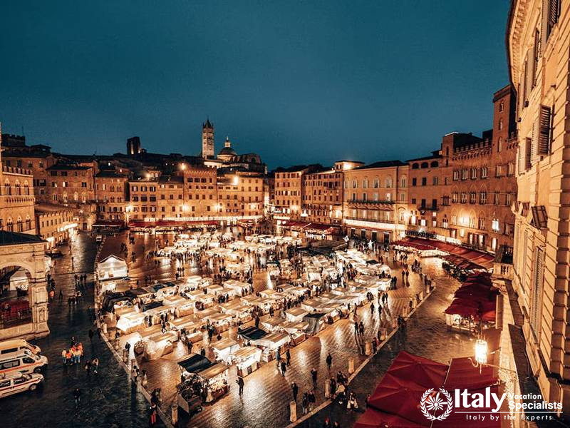 A festive display with Christmas lights in Siena’s Piazza del Campo