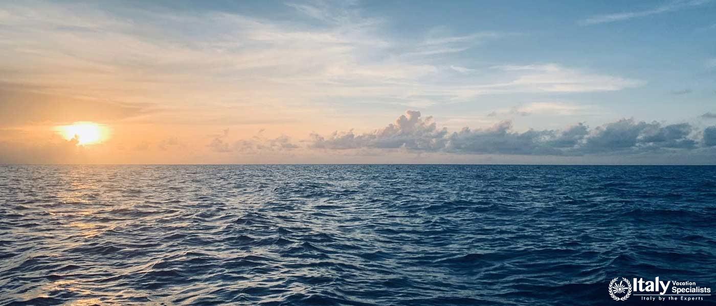 Sunset Over the Sea: A stunning view of the sunset over the tranquil waters of the Amalfi Coast