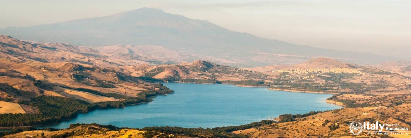 The lake of Pozzillo, with volcano Etna in background 