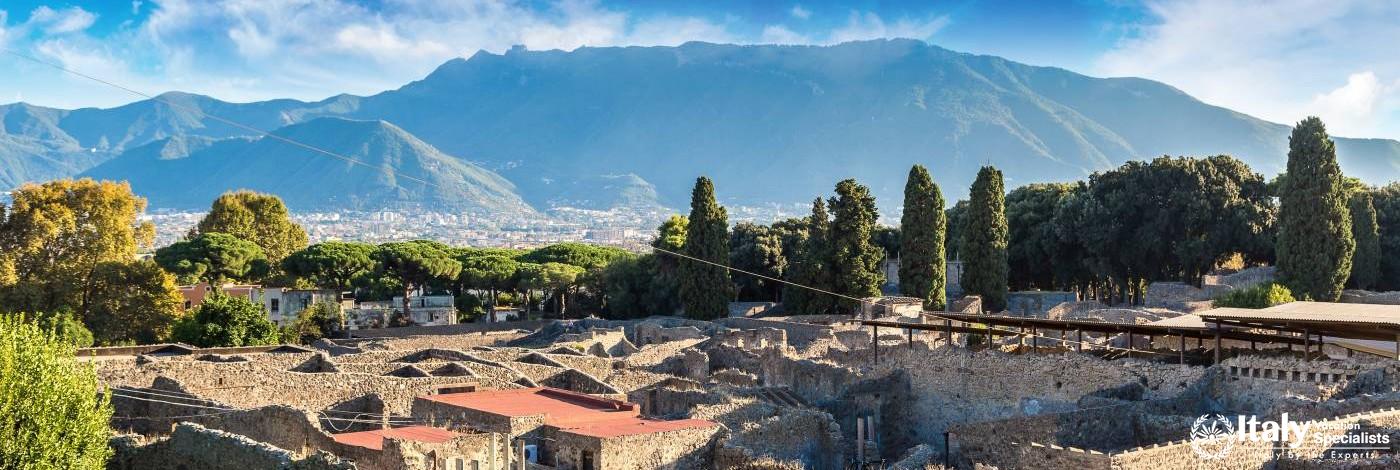 Mt. Vesuvius behind ruins of Pompeii, Italy
