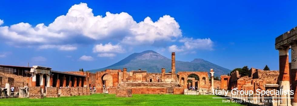 Spectacular Ruins of Pompeii with Vesuvius Behind 