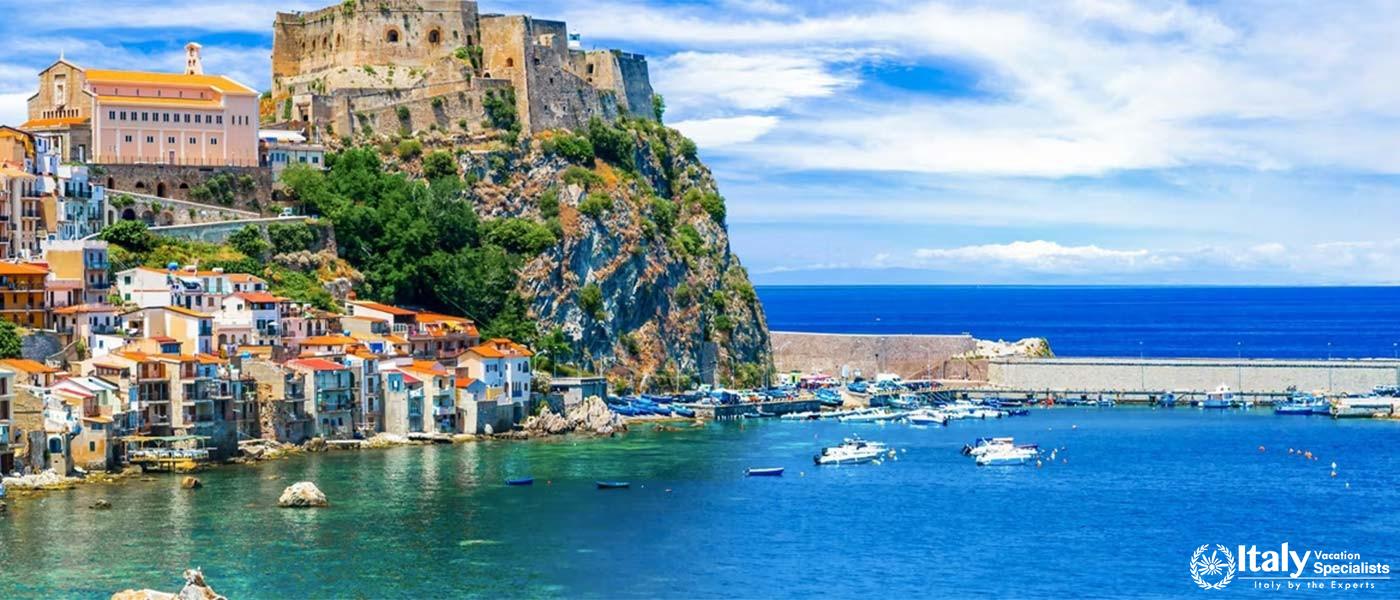 Beautiful seaside view of CefalÃ¹, showcasing the charming town along the coast with its rocky hillt