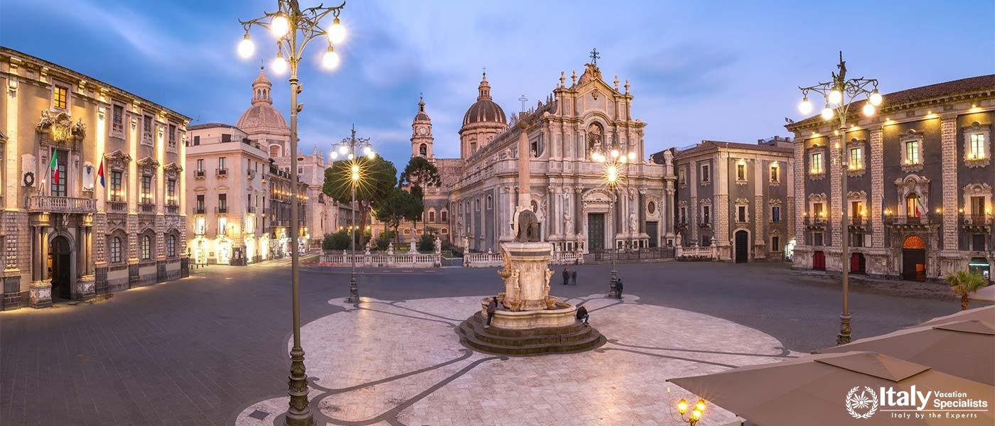 Panoramic view of the Piazza del Duomo in Catania, featuring the historical architecture and the Cat