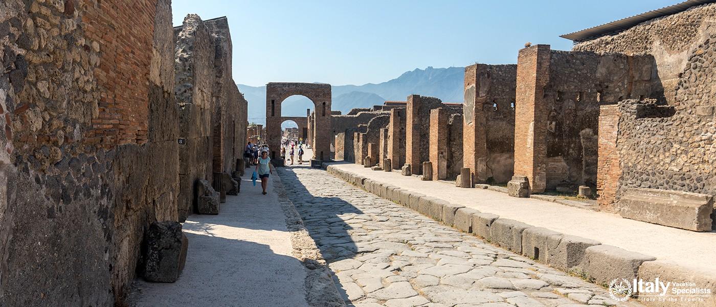 Pompeii, Italy - June 15, 2017 An ancient cobbled street in the ruins of Pompeii, Italy. Roman town 