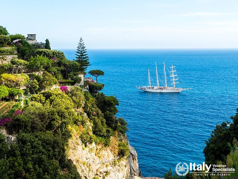 View of sailing ship off the coast, Positano, Costiera Amalfitana, Sorrento Peninsula, Amalfi Coast,