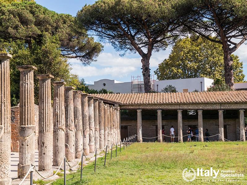 The View of theYard in the Ruins in Pompeii near Modern Naples, Italy